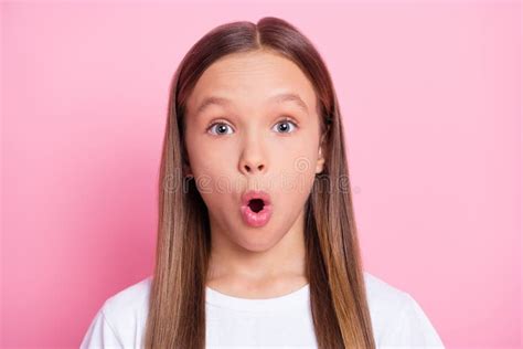 Portrait Of Surprised Little Girl Looking At Camera With Shocked Facial