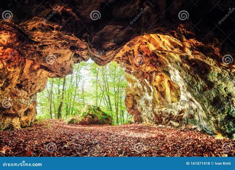 Cave In Spring Forest Stock Photo Image Of Light Exploration 161071418
