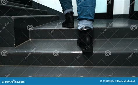 Close Up Of Feet Climbing Staircase Concept Beautiful Feet In Leather