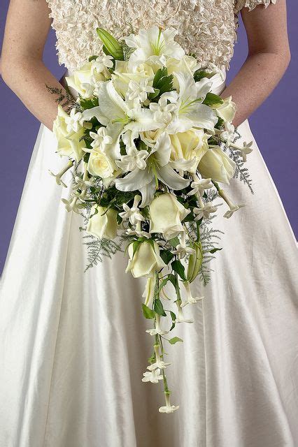 Artificial wedding flowers we purchase in large volume to pass the savings on to you. Cascade Bridal Bouquet | Cascading bridal bouquets ...