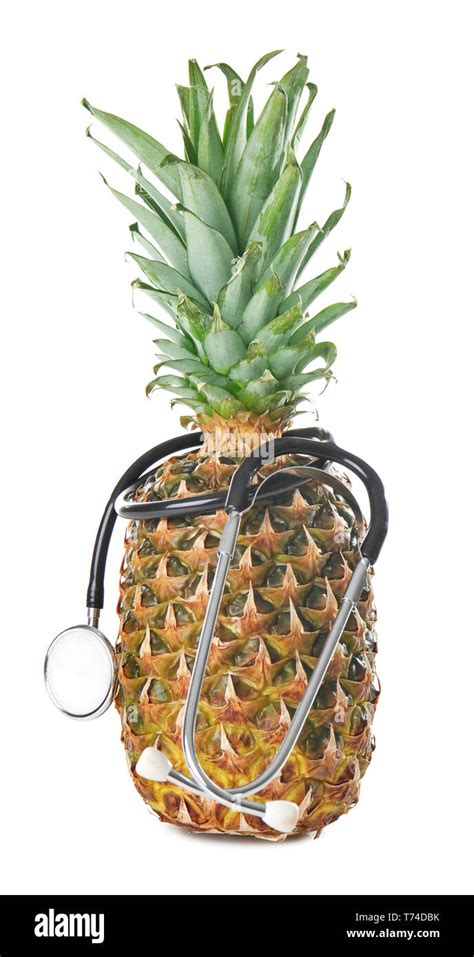 Pineapple With Stethoscope On White Background Healthy Food Concept