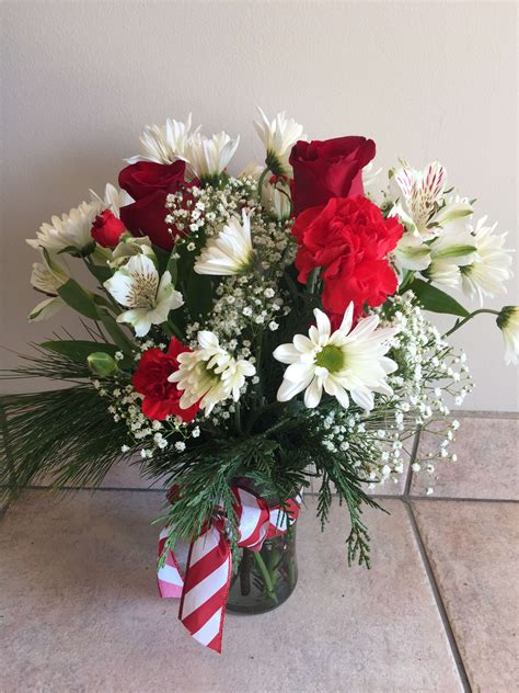 *not all pictured are licensed & qualified to embalm, make funeral arrangements, or conduct funerals* recent obituaries Christmas Cheer Vase in Mount Laurel, NJ | Flowers by ...