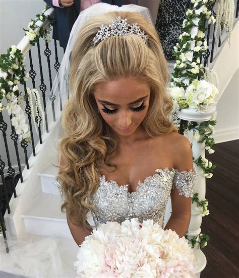 Should my hair be washed before trying out bridal hairstyles? Our stunning princess bride Jasmine wearing a custom ...
