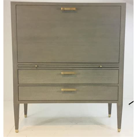 We rounded up our favorite modern secretary desks that are compact and functional enough for even the smallest of spaces. Ave Home Modern Gray Carlyle Secretary Desk | Chairish