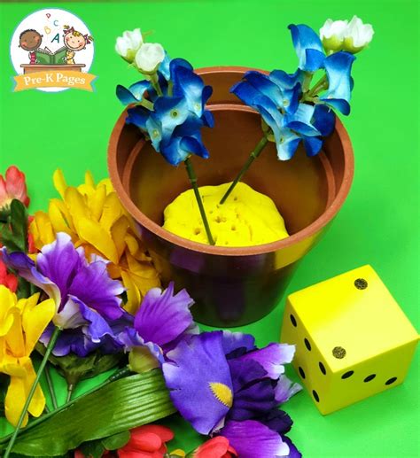 Some flowers need to be matched twice. Spring Flower Math Game for Preschool - Pre-K Pages
