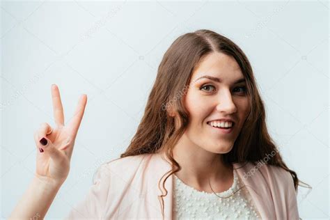 Woman Showing Victory Gesture — Stock Photo © File404 113656454