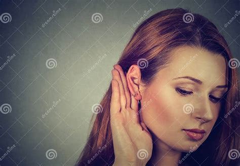 Woman Holds Hand Near Ear And Listens Carefully Stock Image Image Of