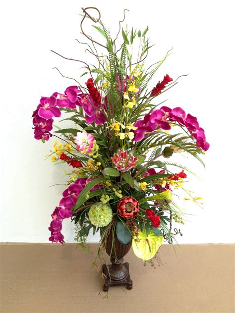 Orchid Mixed With Tropical Flowers Designed By Arcadia Floral And Home Decor Tropical Floral
