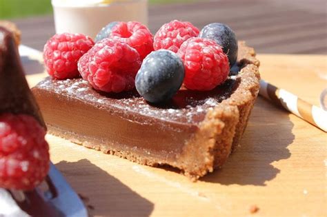 With a shock frozen creamy loading dotted with wonderful joyful active ingredients, this is a great dessert for christmas. Jamie Oliver's Chocolate Tart | Chocolate tart, Chocolate, My recipes