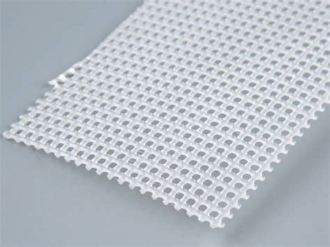 Eoout 36pcs plastic mesh zipper pouch document bag, plastic zip file folders in 11 colors garden expert shade cloth plastic clips 20pcs accessories grommets for net, mesh, cover. A piece of plastic mesh obliquely placed on gray ...
