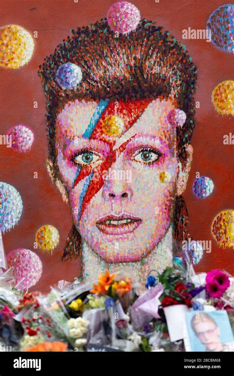 Mural Of David Bowie In Brixton Surround By Memorial Offerings Laid Just After His Death London