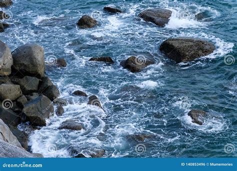 Blue Sea With Wave Hitting On Rocks Stock Photo Image Of Journey