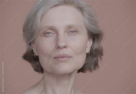 Cu Portrait Of Beautiful 60s Grey Haired Mature Senior Adult Female Posing Without Makeup