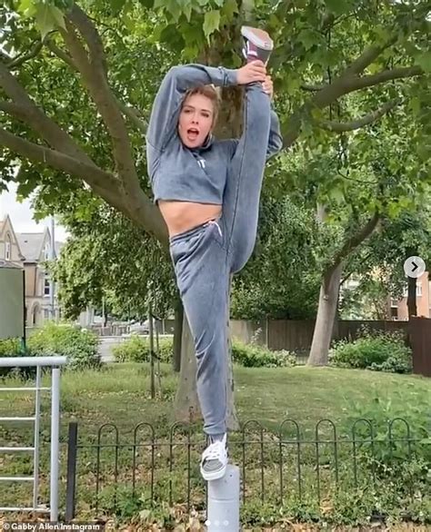 gabby allen demonstrates her very flexible moves as she larks about on a walk daily mail online