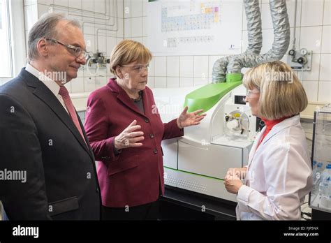 German Chancellor Angela Merkel C And The State Premier Of The