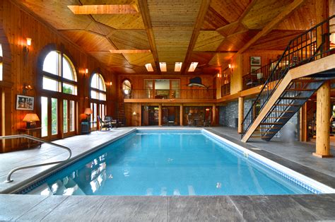 The indoor pool is illuminated by soft, colorful club lights; Amazing Indoor Pool in House | Dream Homes | Mortgage ...