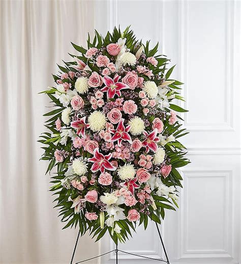 pink and white funeral standing spray 148716