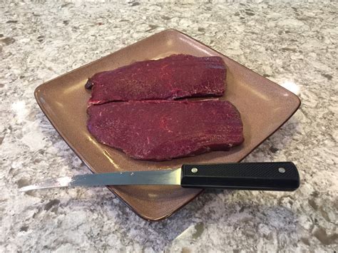 Place a sheet of wax paper onto the cutting board. How to Tenderize Venison - Venison Thursday
