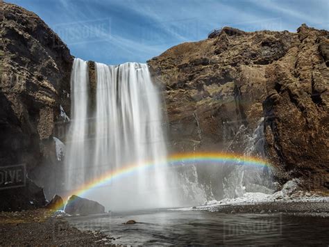 Rainbow Over Skogafoss Waterfall Iceland Stock Photo Dissolve