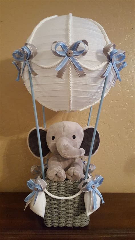 Another creative idea is to hang wall art of baby elephants throughout the. Elephant themed Baby Shower. Hot air balloon by Tina ...