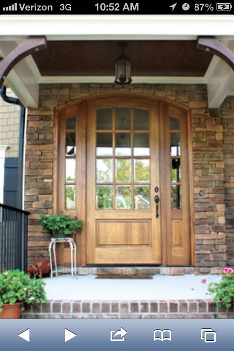 Traditional front door with sidelights. Front Door | Traditional front doors, Arched front door ...
