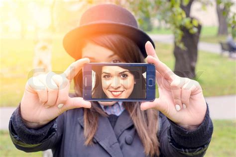 female making selfie stock image colourbox