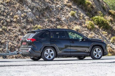 An attractive price doesn't hurt, either. Toyota tests plug-in hybrid RAV4 SUV in new images | Autocar