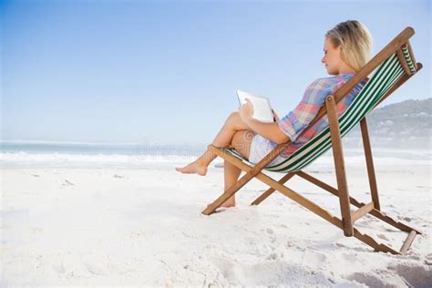 Woman Sitting On Beach In Deck Chair Using Tablet Pc Stock Image Image Of Shore Attractive