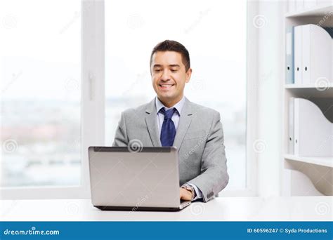 Happy Businessman Working With Laptop In Office Stock Image Image Of