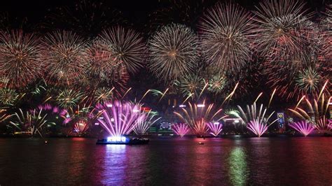 Fireworks Light Up Hong Kongs Iconic Skyline As Revellers Celebrate
