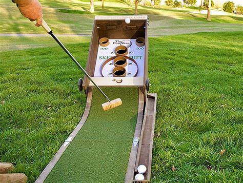 The skee ball machine is a wonderful thing. PuttSkee Combines Golf and Skee-Ball | Diy yard games, Backyard games diy, Backyard games