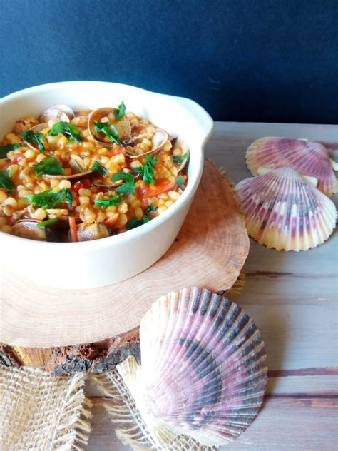 Check spelling or type a new query. FREGOLA CON VONGOLE E POMODORINI