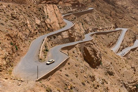 Long Shot Of Winding Mountain Road In Morocco On Sunny Day Mountain