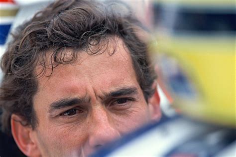 A Close Up Of A Man With Curly Hair