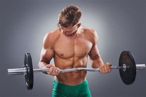 Handsome Man Doing Biceps Curls Stock Image Image Of Muscular Sports