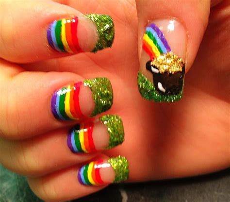 We could have gone all out with complex nail art of shamrocks and rainbows. Nails NailArt nail art St. Patricks gold treasure rainbow ...