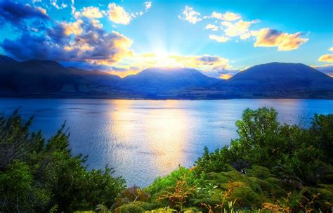 If you're in search of the best background nature pictures, you've come to the right place. Mountains lake water Nature green clouds sun sky - Phone ...