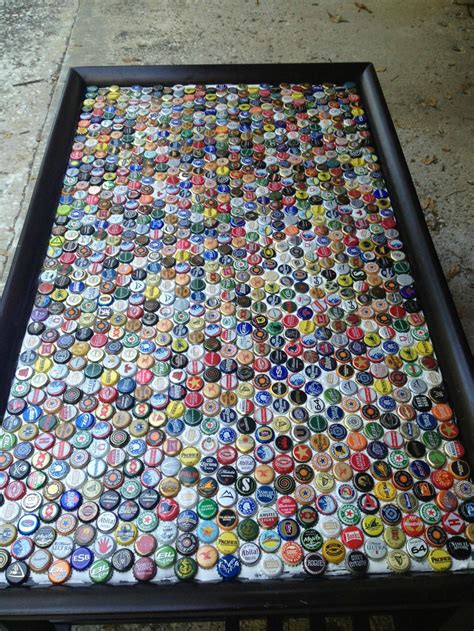 I convert all of my craft beer caps into magnets and mix them in with some bmc caps, all of which are i hope to have a bar on the opposite side of the garage so when i open the garage door, you can look i see a keo cap in lower right of the main photo. 18 DIY Beer Bottle Cap Table Designs | Guide Patterns
