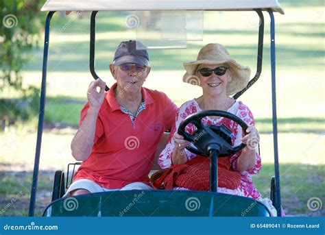Senior Couple In Golf Cart Stock Image Image Of Female 65489041