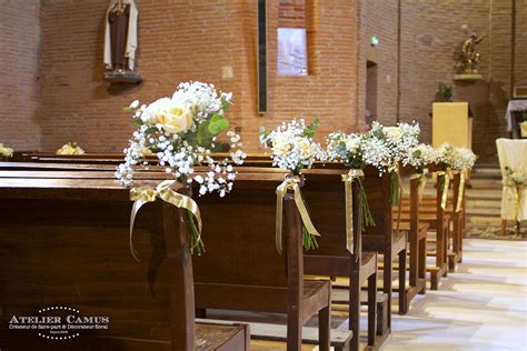 Décoration mariage église Fleuriste mariage église Bouquet banc d église