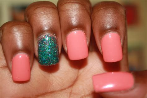 What kind of nail art is best for middle finger? coral nails with accented ring finger with teal glitter ...