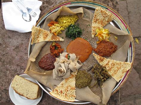 Check out this recipe on my new and improved website: Authentic Injera (Ethiopian Flatbread) - The Daring Gourmet