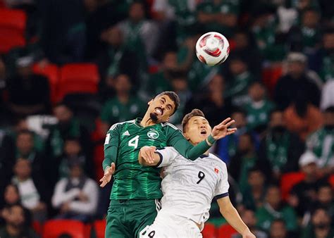 saudi arabia beat nine man kyrgyzstan to move into asian cup knockouts reuters
