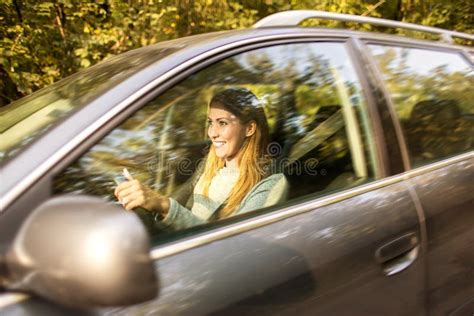 Mujer Que Conduce El Coche Imagen De Archivo Imagen De Driving 100876953