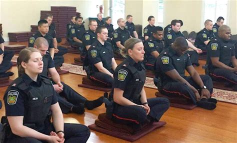 Most police officers receive benefits, such as pension plans, health coverage, and sick days. Look at These Cops Meditating Before They Hit the Streets ...