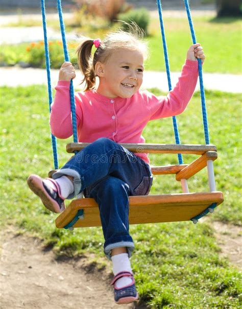 Cute Little Girl On Swing Stock Photo Image Of Innocence 21367344