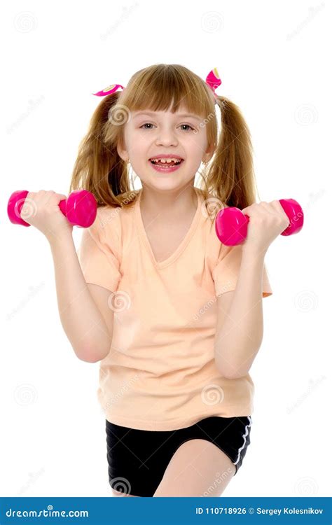 Little Girl Doing Exercises With Dumbbells Stock Photo Image Of