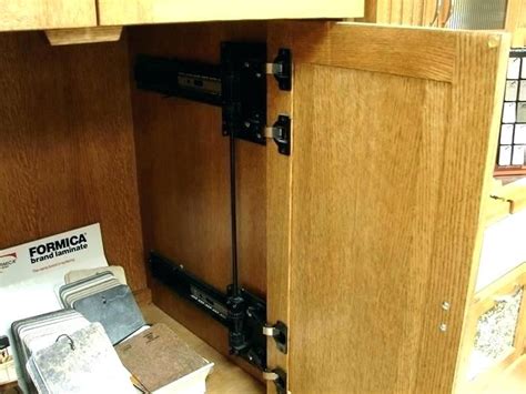 They enable cabinet doors to swing open, and then slide back into the sides of your cabinet. Pivot Door Slide Fantastic Retractable Cabinet Doors Slide ...