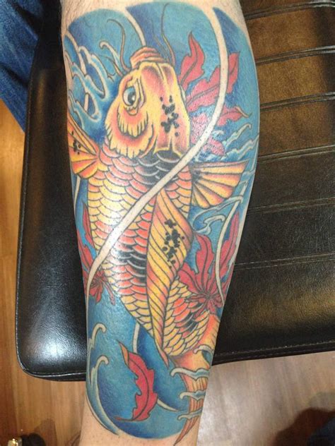 25 Awesome Koi Fish Tattoo Designs For Men