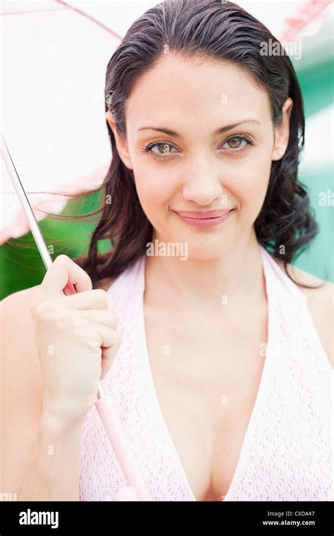 Caucasian Woman Holding Umbrella Stock Photo Alamy